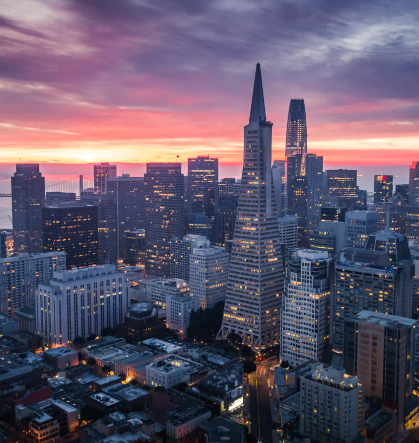 An image of a city skyline at dusk.