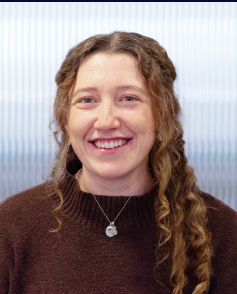 A headshot of Georgie Clayton-Wells.