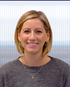 A headshot of Sam Love.