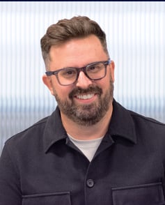 A headshot of Sam Evans